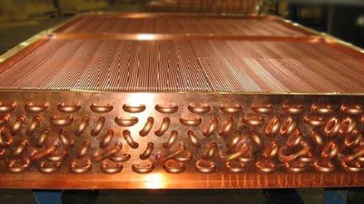 AI Designs Its Own Infrastructure: The Copper Cooling Breakthrough and the Future Memory of the Built World
